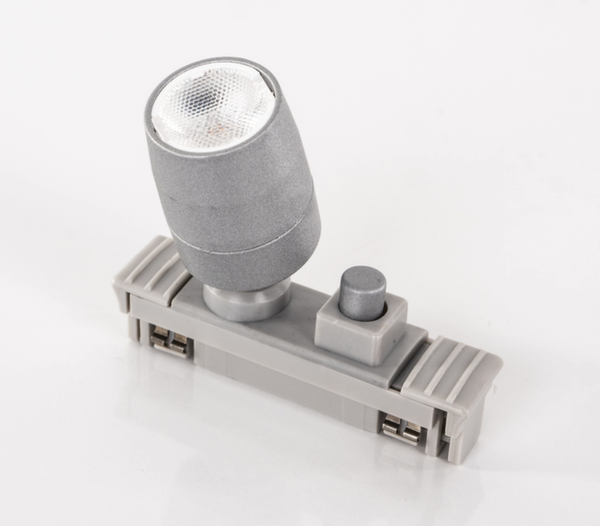 Lis&auml;kohdevalaisin kytkimell&auml; kiskovalaistusj&auml;rjestelm&auml;&auml; varten hopea